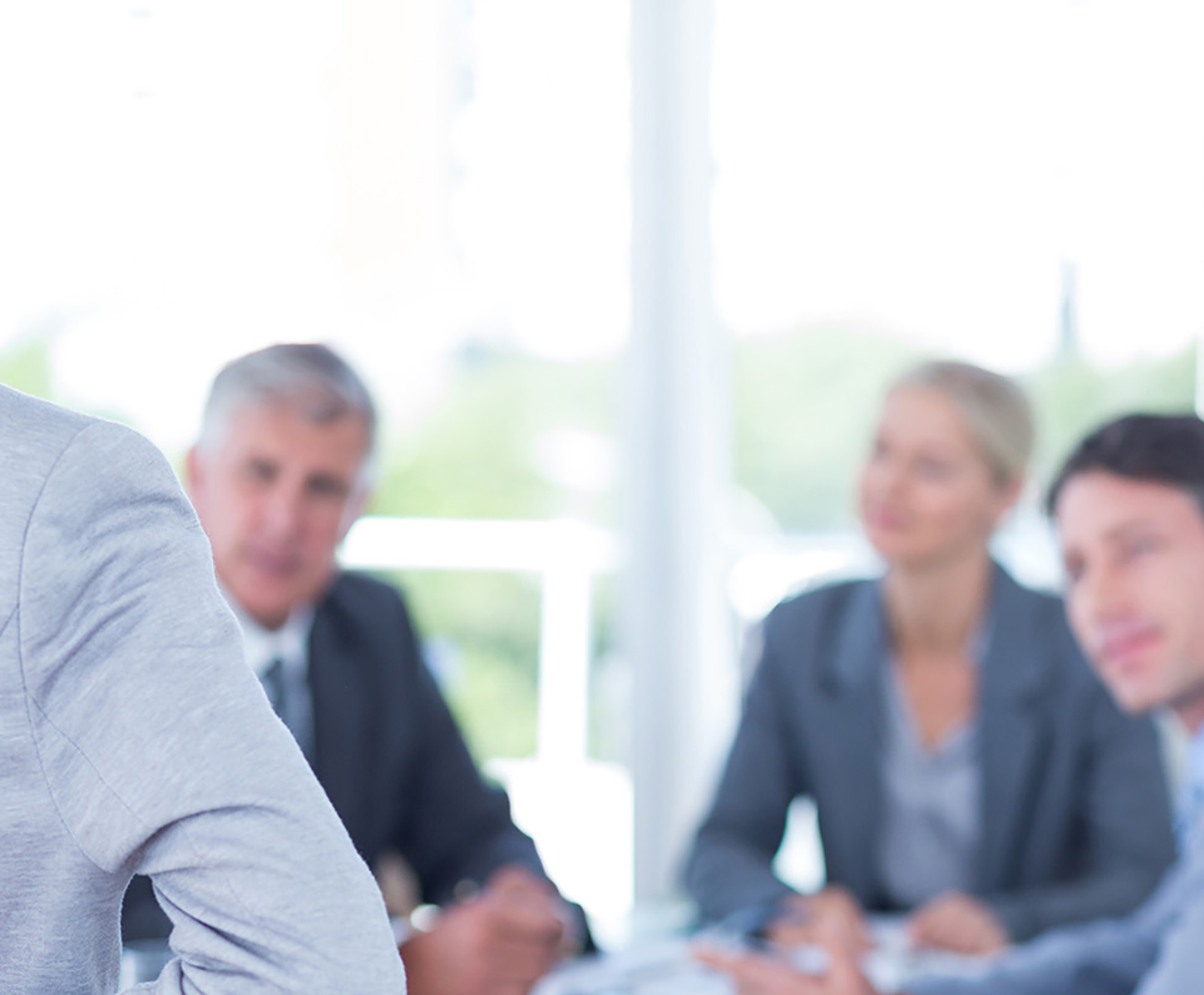 Businesswoman with fingers crossed behind her back in an office